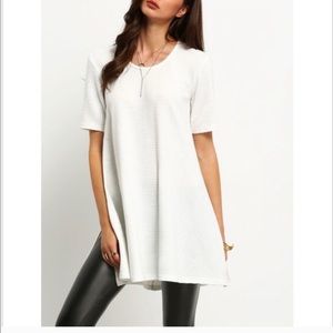 Ribbed tunic top, side slits, machine wash.